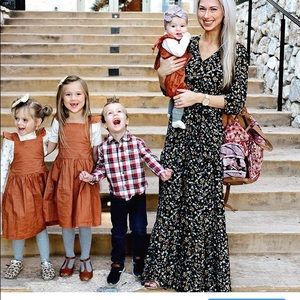 Black floral lined, tiered maxi dress. Long sleeve